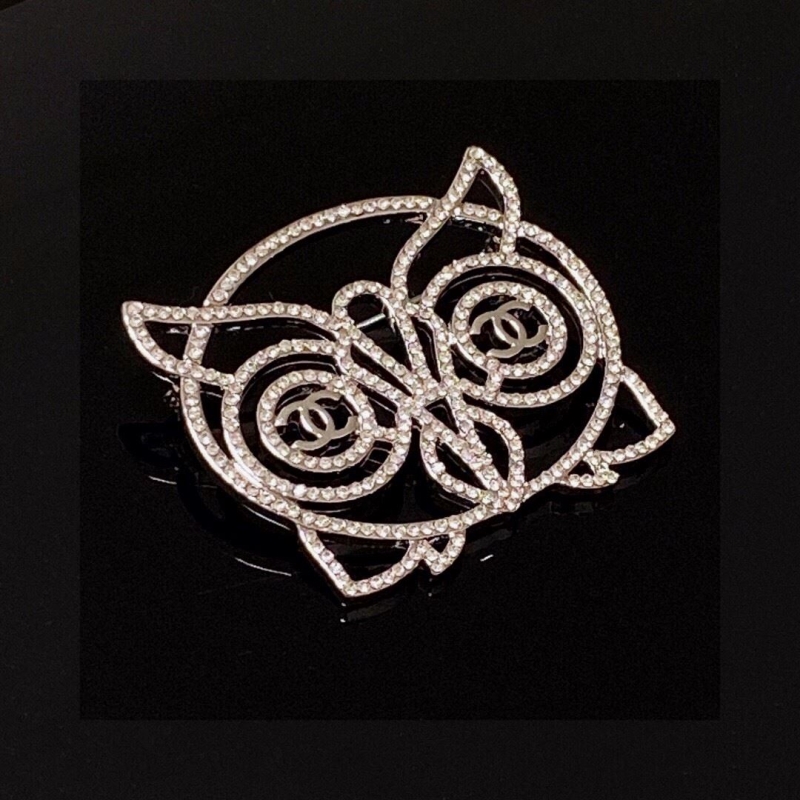 Ch*el brooches